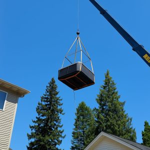 hot tub spa lifting over trees crane